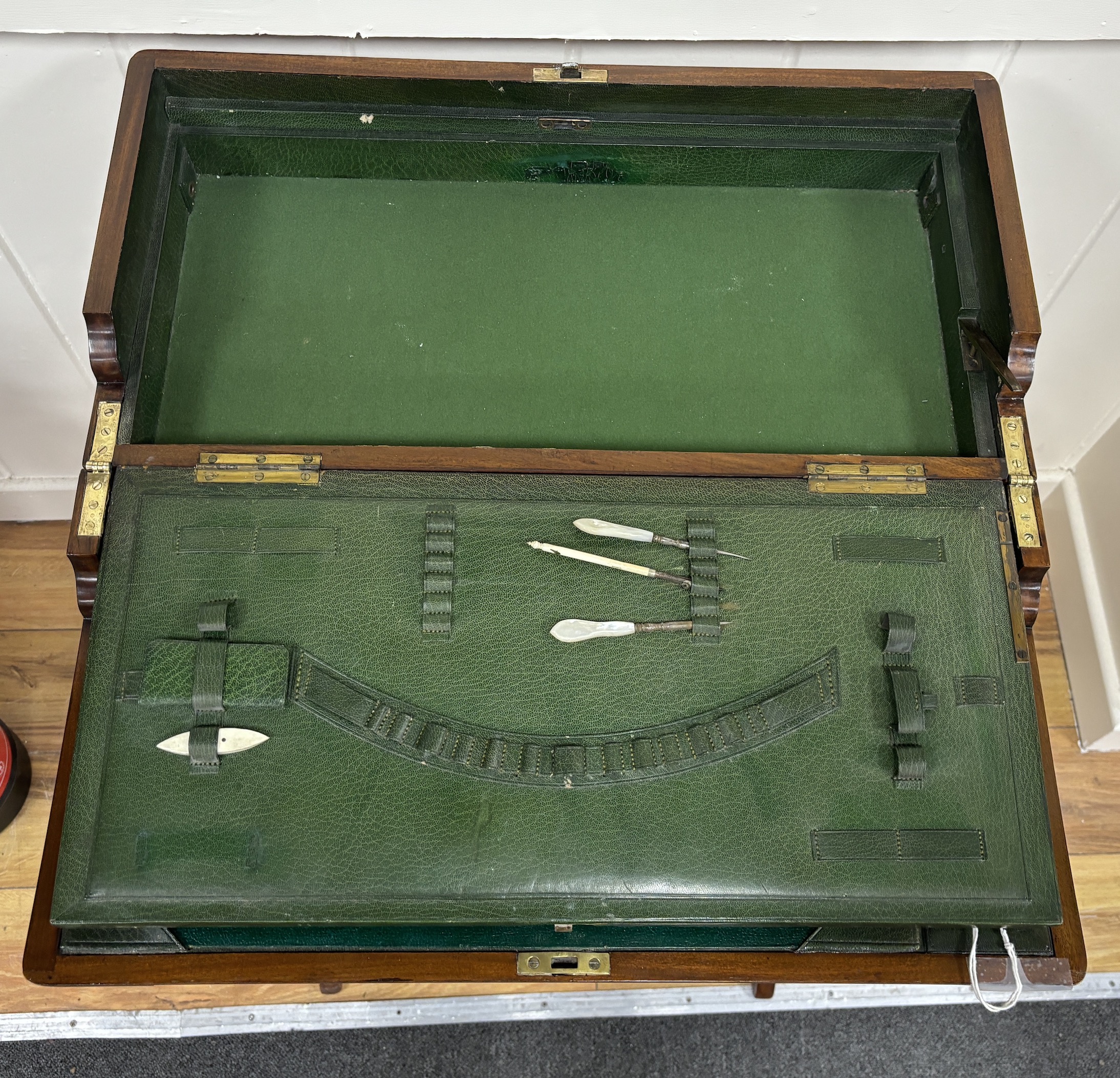 An early 20th century mahogany travelling or campaign desk, width 61cm, depth 30cm, height 85cm